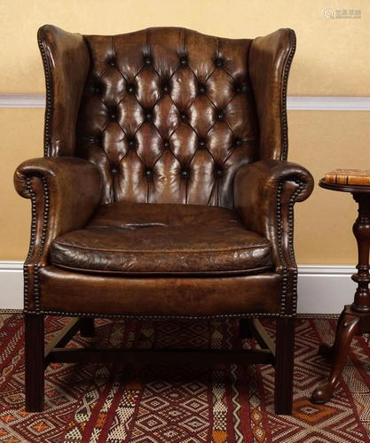 EDWARDIAN HIDE UPHOLSTERED WING BACK ARMCHAIR