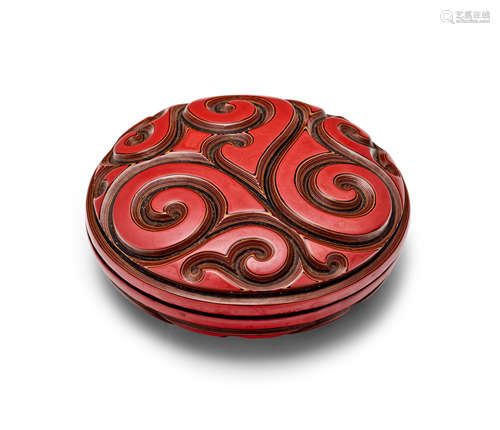 A Finely Carved tixi Cinnabar lacquer three-color circular shallow-domed box and cover Yuan/Early Ming Dynasty, 14th-15th Century