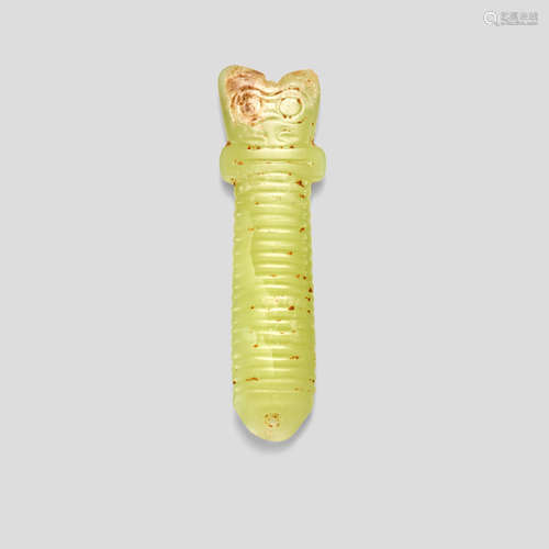 A pale 'yellow' jade sword-shaped pendant Shang Dynasty or later