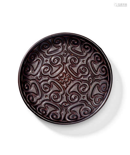 A Tixi black and cinnabar lacquer small circular dish 14th-15th Century