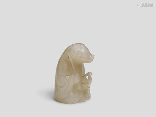 A Miniature white jade seated figure of a 'Zodiac' archer with pigs head 18th Century