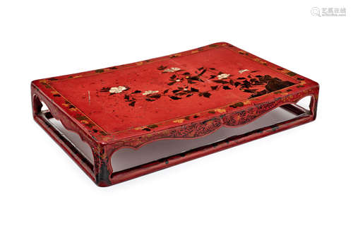 A Qing red lacquer and painted low rectangular stand 18th century