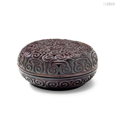 A Tixi Black and cinnabar lacquer circular shallow-domed box and cover Ming Dynasty, 15th/16th Century