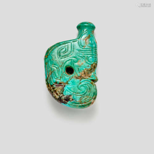 A Turquoise matrix coiled 'pig-dragon' pendant Shang Dynasty or later