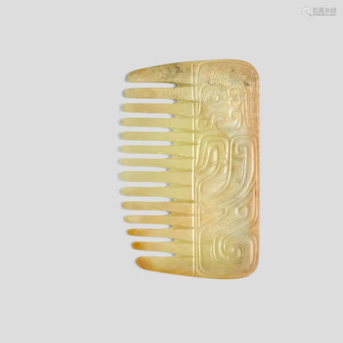 A Celadon and pale russet jade 'Shaman' Comb Western Zhou Dynasty, Dawenkou Culture