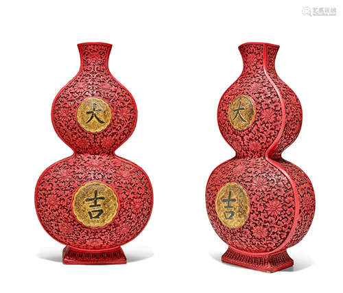 A PAIR OF RARE LARGE CINNABAR LACQUER DOUBLE-GOURD 'DAJI' VASES Qianlong