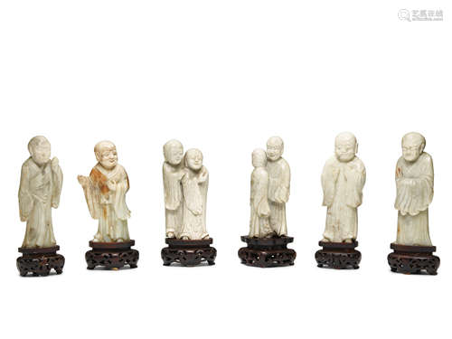 A Group of six grey, cream and celadon jade figures of Luohans Ming-Qing Dyansty