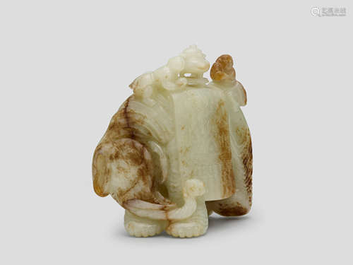 A Pale celadon-White and russet Jade 'elephant and Hehe Erxian' group 17th/18th Century