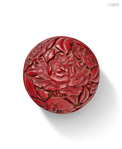 A Ming carved cinnabar lacquer circular cover (and box) The cover 15th Century, the replacement Japanese box possibly Muromachi period