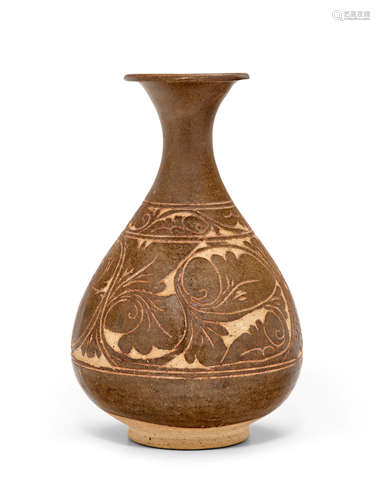 A carved Cizhou brown-glazed buff stoneware vase, yuhuchunping Jin-Yuan Dynasty