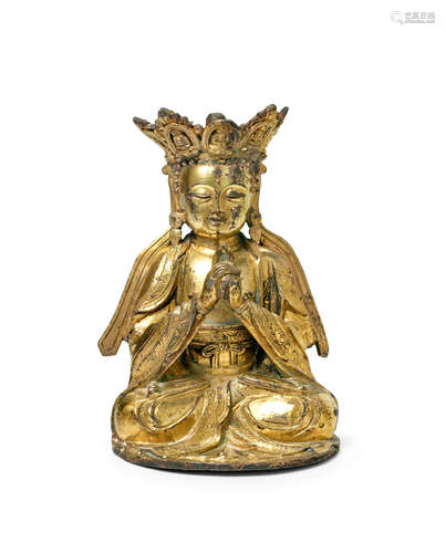 A small gilt bronze figure of the seated Buddha Vairocana Late Ming-Early Qing Dynasty