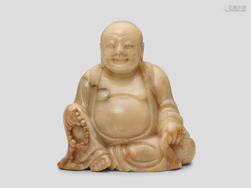 A cream soapstone figure of Budai 17th/18th Century