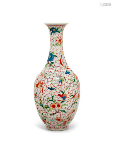 An unusual enameled cracked-ice-ground 'butterflies and flowers' slender oviform vase Jiaqing underglaze-blue six-character mark and possibly of the period (1796-1820)