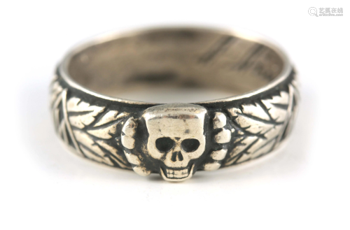 A 20TH CENTURY NAZI SS THUMB RING with deaths head