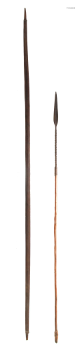 A 19TH CENTURY AFRICAN THROWING SPEAR with iron barbed