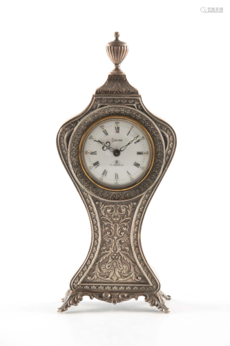 AN EARLY 20TH CENTURY SILVER SWIZA ALARM CLOCK with