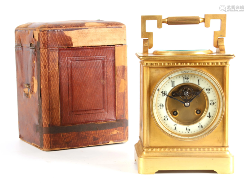 A LARGE FRENCH GILT BRASS CARRIAGE CLOCK WITH COMPASS