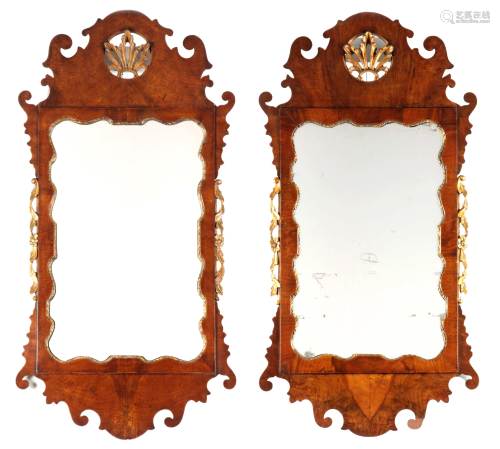 A PAIR OF GEORGE II WALNUT AND GILTWOOD HANGING MIRRORS