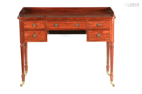 A 19TH CENTURY MAHOGANY DRESSING TABLE IN THE MANNER OF