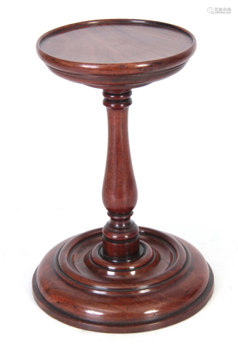 AN 18TH CENTURY MAHOGANY TURNED CANDLE STA…