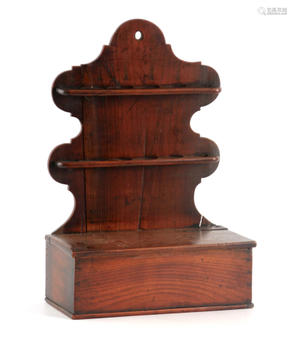AN 18TH CENTURY ELM SPOON RACK with shaped back ab…