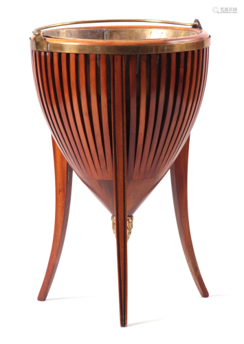 AN EDWARDIAN MAHOGANY PLANTER with slated body and