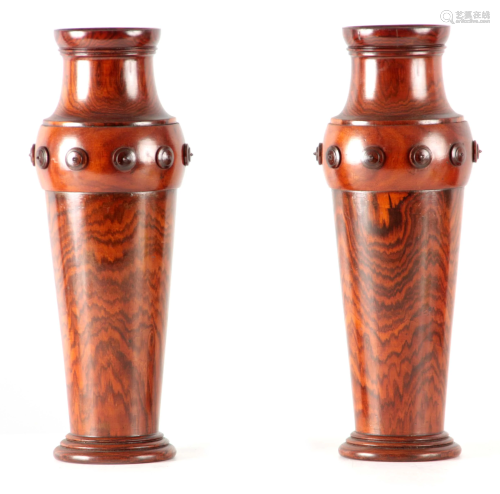A PAIR OF EARLY 20TH CENTURY TURNED ROSEWOOD