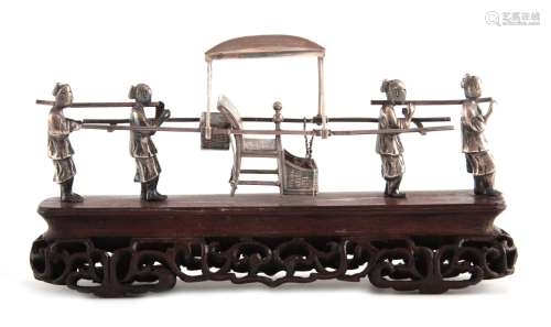 A LATE 19TH CENTURY CHINESE SILVER SEDAN CHAIR carried