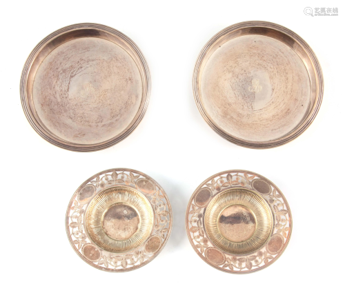 A PAIR OF 19TH CENTURY DUTCH SILVER WINE COASTERS