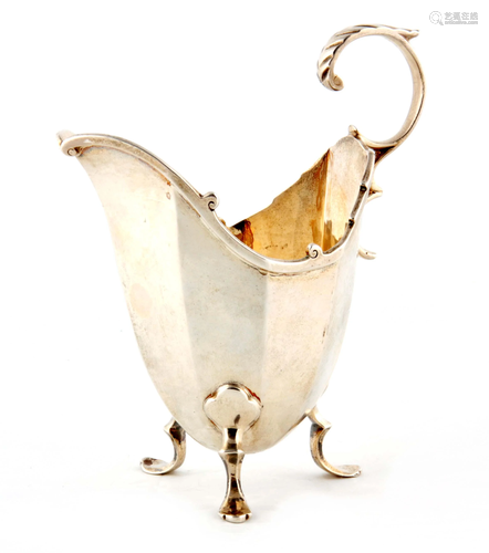 A VICTORIAN SILVER MILK JUG BY SIBRAY, HALL & Co