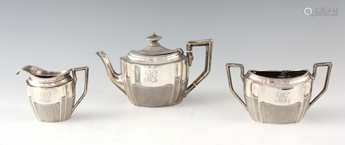 A LATE VICTORIAN SILVER THREE PIECE TEA SERVICE each