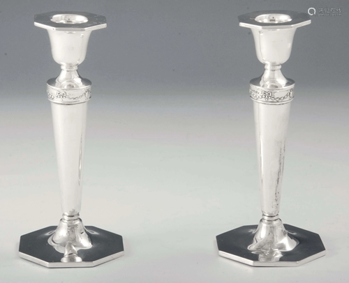 A PAIR OF GEORGE V ADAM STYLE SILVER CANDLESTICKS of