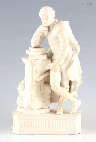 A 19TH CENTURY PARIAN WARE FIGURE OF A SCHOLAR 25cm