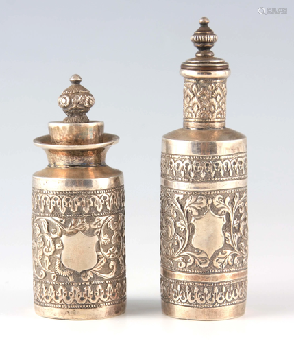 TWO EASTERN SILVER METAL BOTTLES AND STOPPERS with