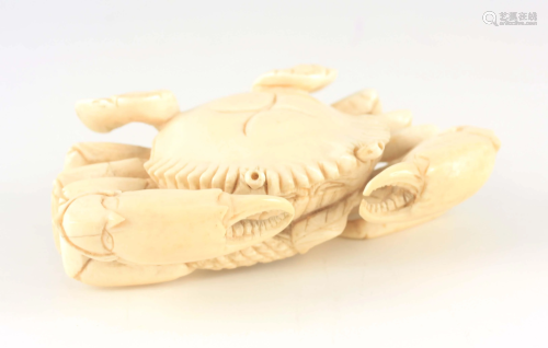 A MEIJI PERIOD JAPANESE CARVED IVORY CRAB realistically