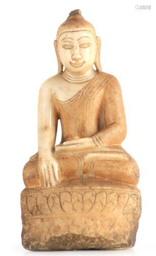 AN EARLY TIBETAN CARVED ALABASTER FIGURE OF A SEATED