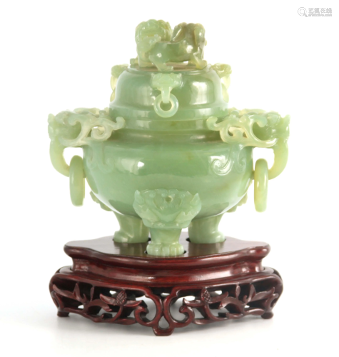 A LARGE CHINESE JADE KORO AND COVER surmounted by two