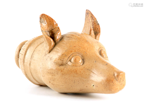 AN EARLY 19TH CENTURY STONEWARE FOX HEAD STIRRUP CUP