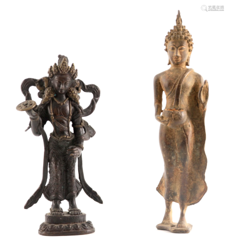 AN ORIENTAL BRONZE FIGURE OF A DEITY 24cm high together