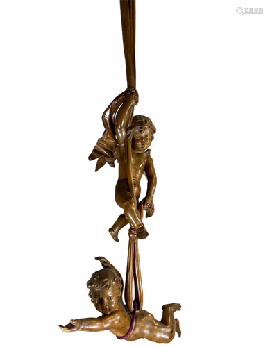 Large wooden hanging sculpture decorated with two