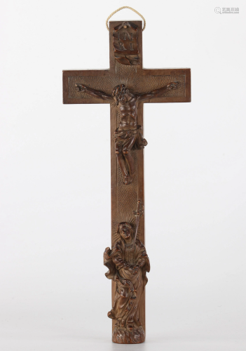 Reliquary cross in carved baroque art from southern