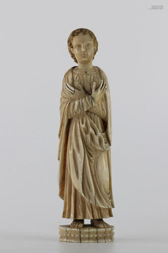 Large religious sculpture of a young boy from the late