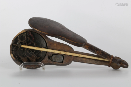 old opium scale with a wooden violin-shaped case