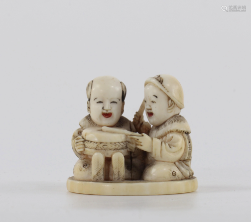 Netsuke carved with two characters Japan Meiji period