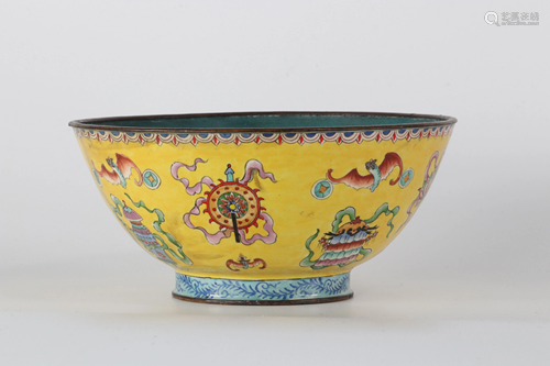 Cloisonne enamel bowl on a yellow background decorated