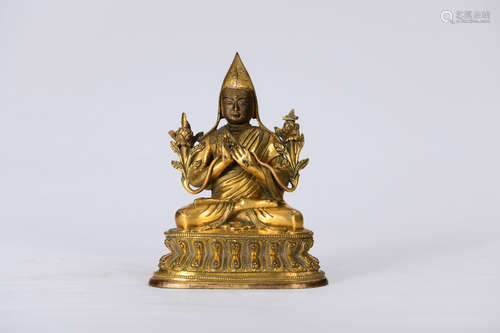 A GILDING COPPER SITTING TSONGKHAPA STATUE