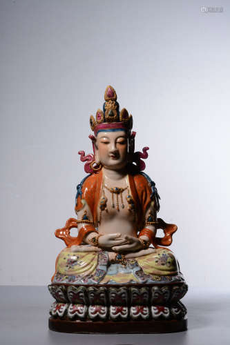 FAMILLE ROSE AND CARVED 'GUANYIN' SEATED FIGURE