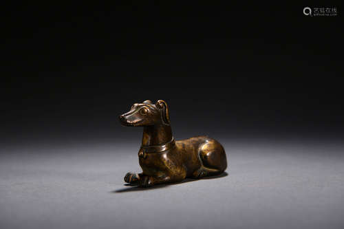 A COPPER DOG ORNAMENT