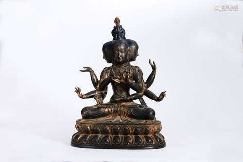 A COPPER SITTING USNISA VIJAYA STATUE