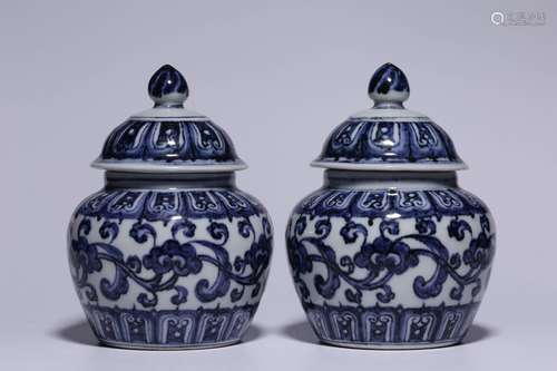 PAIR OF BLUE AND WHITE 'FLOWERS AND VINES' JARS WITH LIDS